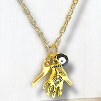 Mística hamsa hand evil eye horn necklace in 14k of gold layered chains