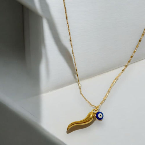 Dainty evil eye horn pendant necklace in 14k of gold layered chains