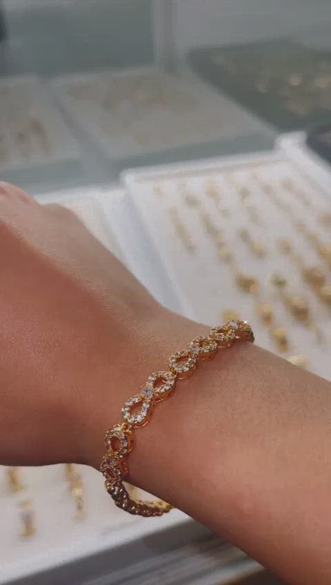 Infinity cz bracelet in 18kts of gold plated