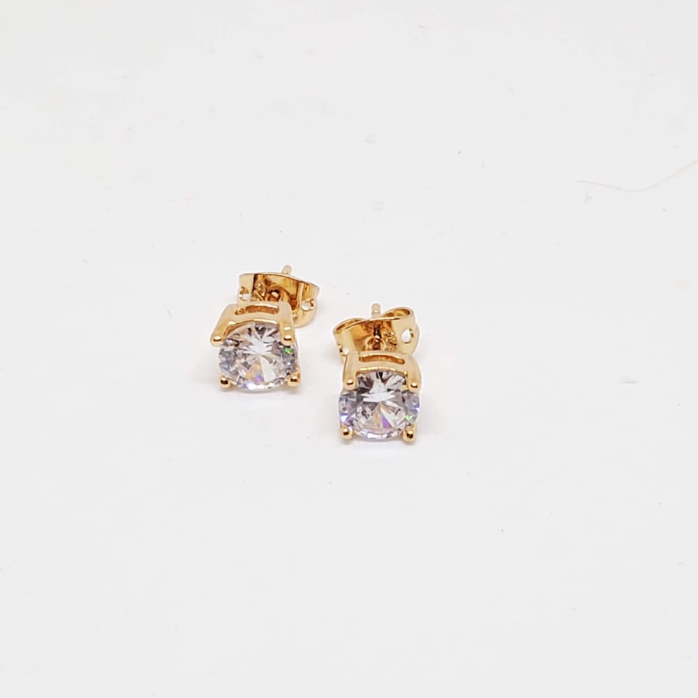 Clear stones studs earrings in 18kts of gold plated earrings