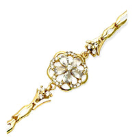 Cz clear flower bracelet in 18kts of gold plated bracelets